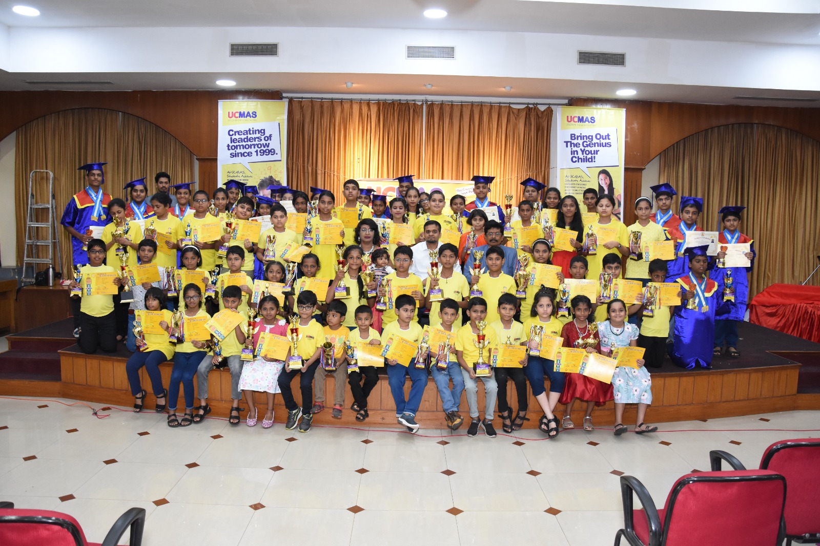 Graduation day celebration with student achievers and proud families